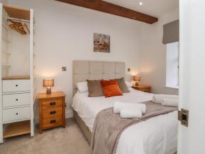 Postel nebo postele na pokoji v ubytování Millnook