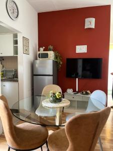 Kuchyň nebo kuchyňský kout v ubytování Apartments Emma