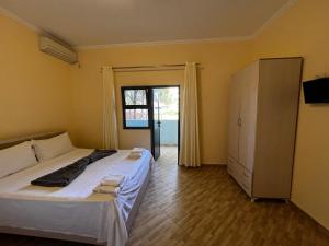 Voodi või voodid majutusasutuse Canary Hotel toas