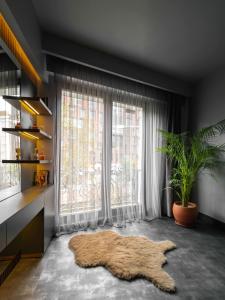 Cama ou camas em um quarto em SennaCity Hotel