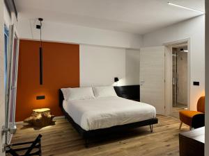 Postel nebo postele na pokoji v ubytování AdisArtur Elegant B&B