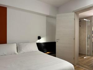 Postel nebo postele na pokoji v ubytování AdisArtur Elegant B&B