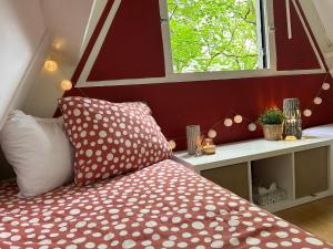 Ένα ή περισσότερα κρεβάτια σε δωμάτιο στο Chalet Du Bois IV