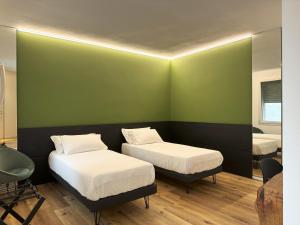Postel nebo postele na pokoji v ubytování AdisArtur Elegant B&B
