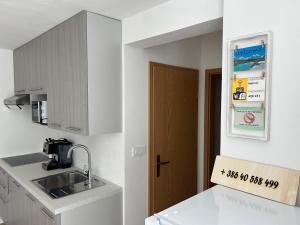 Kuchyň nebo kuchyňský kout v ubytování Apartma Melinc