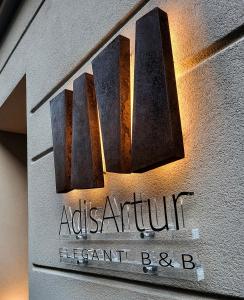 Certifikát, hodnocení, plakát nebo jiný dokument vystavený v ubytování AdisArtur Elegant B&B