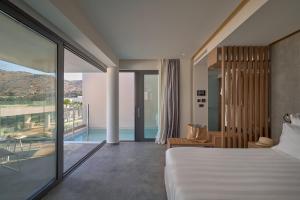 Posteľ alebo postele v izbe v ubytovaní Lindos Grand Resort & Spa - Adults Only