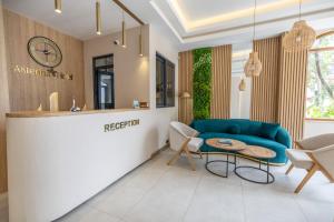 A seating area at Asterina Hotel