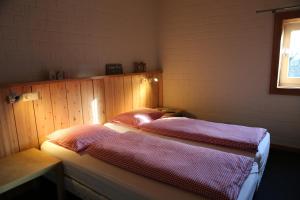 מיטה או מיטות בחדר ב-de Pol