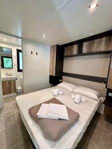 Posteľ alebo postele v izbe v ubytovaní Camping Village Mugello Verde