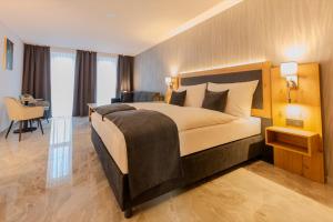 Ένα ή περισσότερα κρεβάτια σε δωμάτιο στο Hotel Tříška