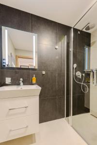 Koupelna v ubytování Hotel Tříška + 37 fotografií
