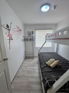 Postel nebo postele na pokoji v ubytování Lan’z cozy 2 bedroom 8 spatial maa + 23 fotografií