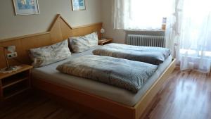 Postel nebo postele na pokoji v ubytování Haus Salzachblick