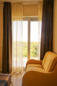 Posezení v ubytování Aparthotel La Pineta