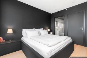 Ένα ή περισσότερα κρεβάτια σε δωμάτιο στο Family Apartment - Good Connection to Oslo