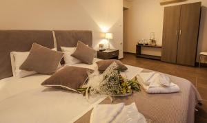 Postel nebo postele na pokoji v ubytování Aqua Mare Sea Side Rooms