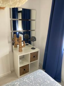 Łóżko lub łóżka w pokoju w obiekcie Balcón de Estepona