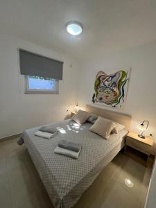 Postel nebo postele na pokoji v ubytování Holiday Home Dorina