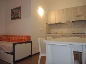 A kitchen or kitchenette at Condominio Sovego