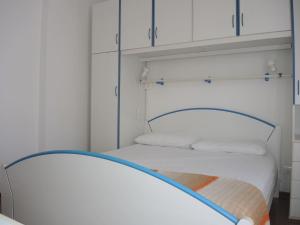 A bed or beds in a room at Condominio Sovego