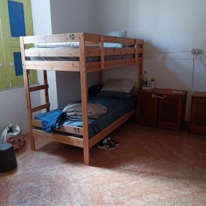 A bed or beds in a room at La Casita de Arrecife