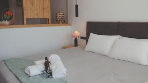 Postelja oz. postelje v sobi nastanitve Moonlight Hotel