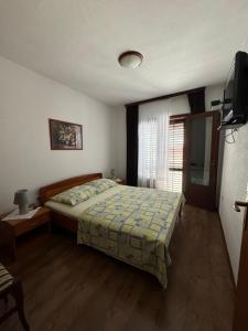 Posteľ alebo postele v izbe v ubytovaní Apartment Tea Katnic