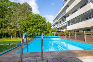 Bazén v ubytovaní MarineLake Apartman Balatonföldvár By BLTN alebo v jeho blízkosti