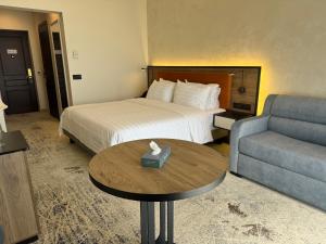 Postel nebo postele na pokoji v ubytování Eighty Eight Deluxe Hotel & Spa