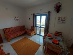 A seating area at Anglo Chalets - Ageeba beach