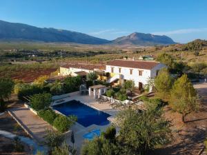 an aerial view of a house with a swimming pool at B&B Boutique Casa Clavi in Chirivel