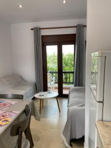 Кровать или кровати в номере Giannis house 2