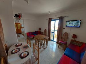 TV a/nebo společenská místnost v ubytování Anglo Chalets - Ageeba beach