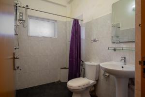 Koupelna v ubytování Hotel Oviya