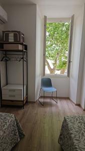เตียงในห้องที่ LP1-SANREMO La tua vacanza nel cuore della città.