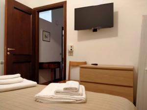 Posteľ alebo postele v izbe v ubytovaní Casa Donna Razietta - Natura e relax
