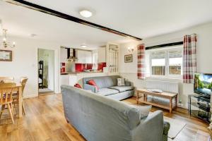 TV a/nebo společenská místnost v ubytování Quarme Cottage Wheddon Cross