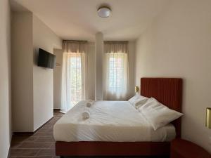 Postel nebo postele na pokoji v ubytování Maison Hermes