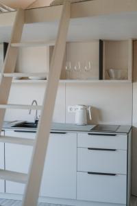 Afbeelding uit fotogalerij van ORE guest houses in Svencelė