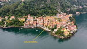 a small town on an island in the water at Casa Bambina in Varenna