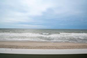 a view of the ocean from a beach at Oceanfront Condo with 3+ Pools - Ocean Dunes 1505 in Kure Beach +44 photos