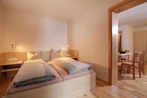 Posteľ alebo postele v izbe v ubytovaní Appartement Dorfblick Top 1
