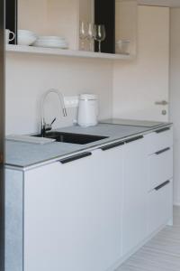 Afbeelding uit fotogalerij van ORE guest houses in Svencelė