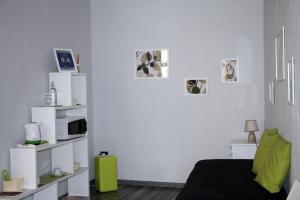 TV a/nebo společenská místnost v ubytování Le Muse