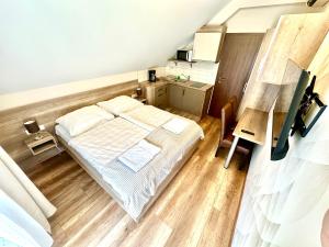 Posteľ alebo postele v izbe v ubytovaní See Vendégház - Siófok