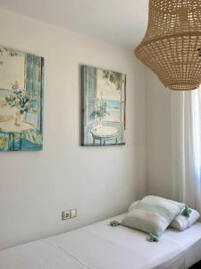 Postel nebo postele na pokoji v ubytování Apartamento VeranoAzul Nerja + 5 fotografií