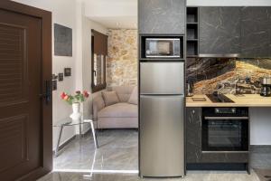 Kuchyň nebo kuchyňský kout v ubytování Anassa 14 Luxury One Bedroom Maisonette
