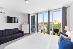 Postel nebo postele na pokoji v ubytování Bocobay Las Islas Condos