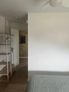 Cama o camas de una habitación en Mirada Do Roxo